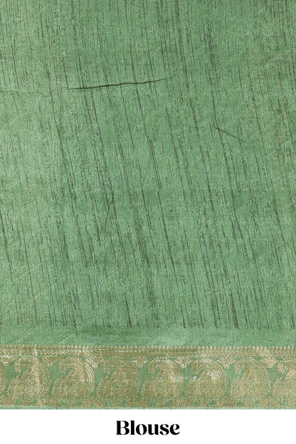 Cream floral design semi dola silk saree with contrast green zari border an blouse