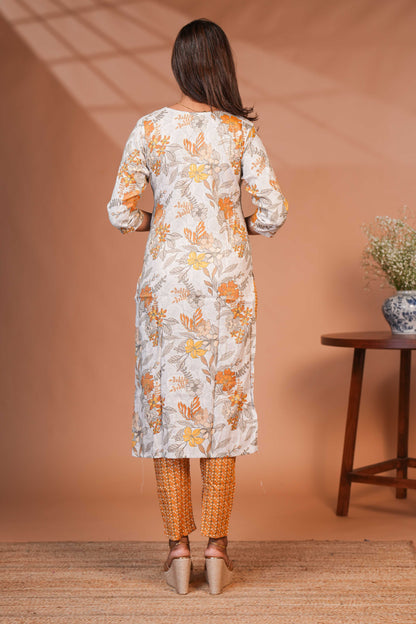 Orange floral design chamki work round neck salwar set with 3/4th sleeve, self bottom and matching dupatta