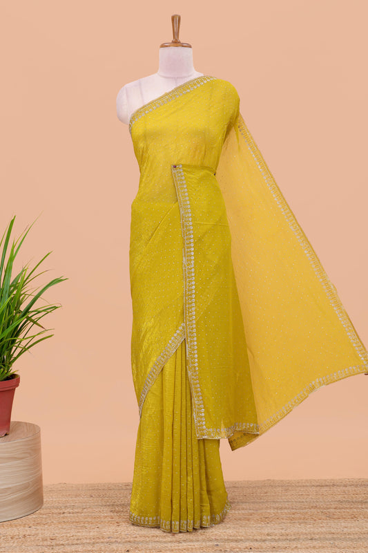Lemon yellow designer georgette space silk saree with heavy stone & beads work, short pallu & contrast sequin embroidered blouse