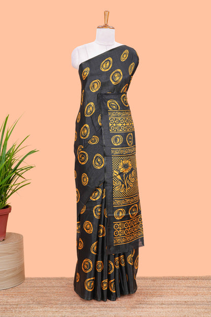 Borderless black south cotton saree with mustard adire batik print on body and pallu