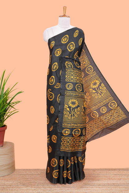 Borderless black south cotton saree with mustard adire batik print on body and pallu