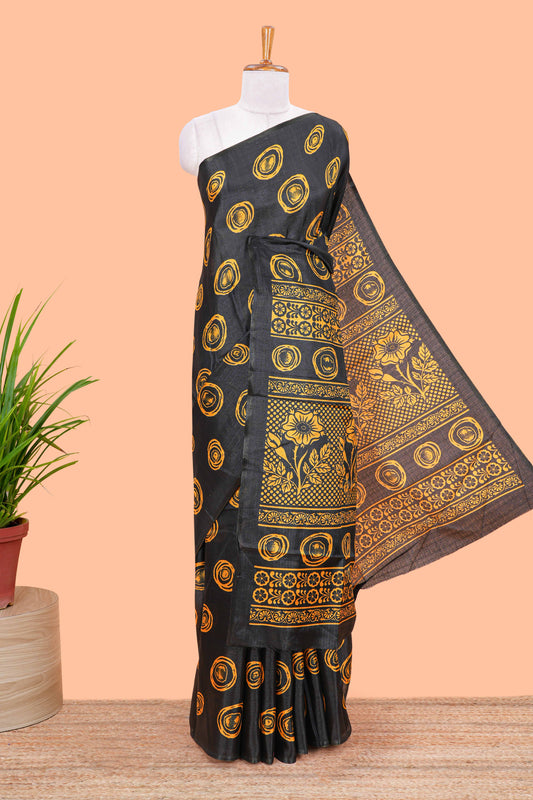 Borderless black south cotton saree with mustard adire batik print on body and pallu