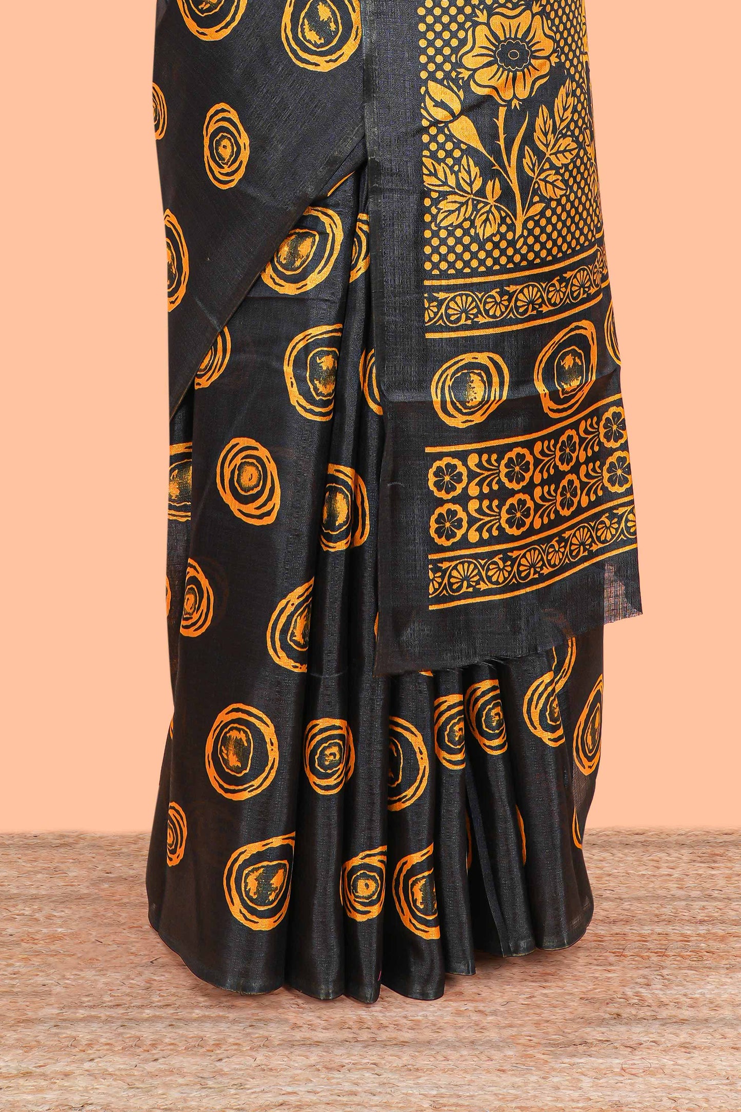 Borderless black south cotton saree with mustard adire batik print on body and pallu