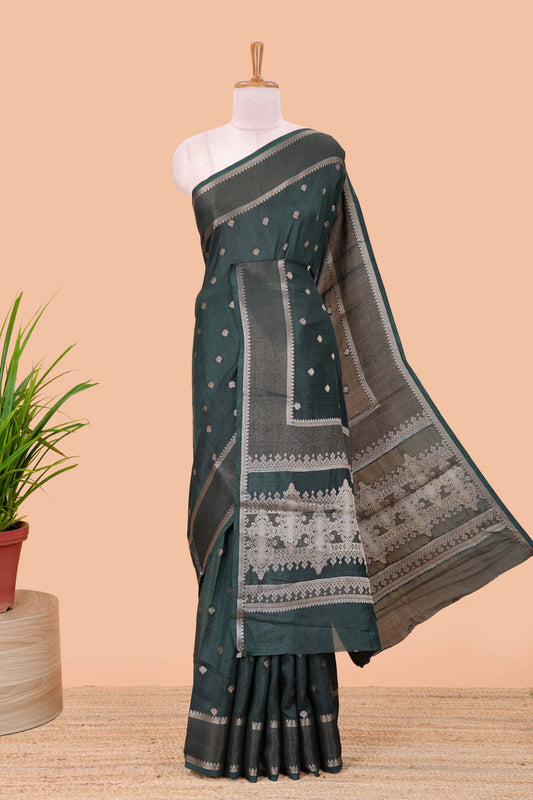 Green dola silk saree with all over zari butta, bendex zari border, rich zari pallu and contrast blouse