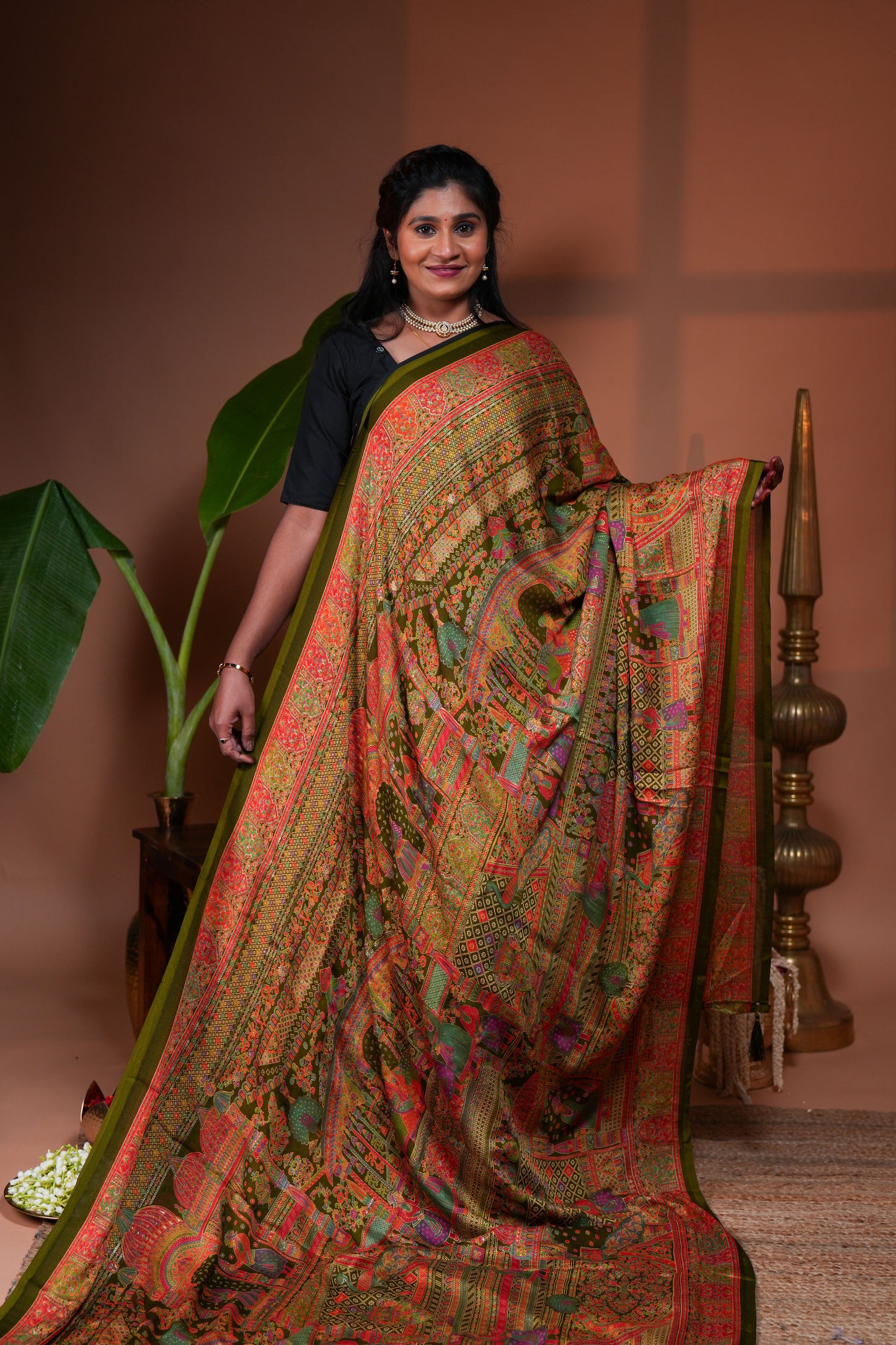 Olive green mughal style foil print georgette saree with self border and matching floral printed blouse