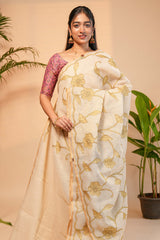 Cream floral design linen cotton saree with self zari border and matching printed blouse