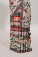 Multicolor Tussar Saree checkered body artistic floral prints and contrasting border with tassel along with blouse piece