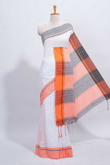 White checked south cotton saree with contrast border and matching striped pallu
