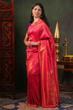 Pink colour Semi Soft Silk Saree with intricate gold zari Leaf vine weaving patterns and Rich zari woven pallu with Matching blouse