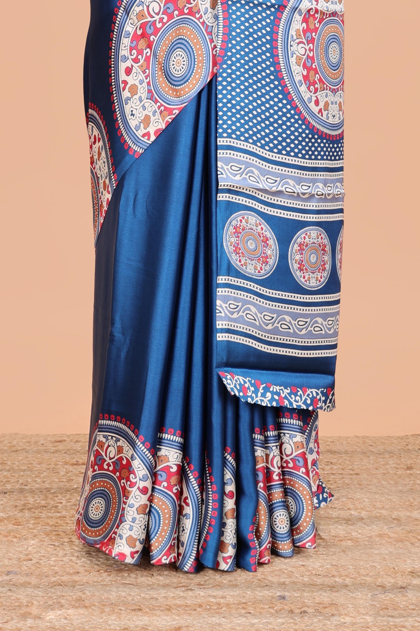 Blue color satin ajrakh modal printed saree with plain border and kalamkari print pallu