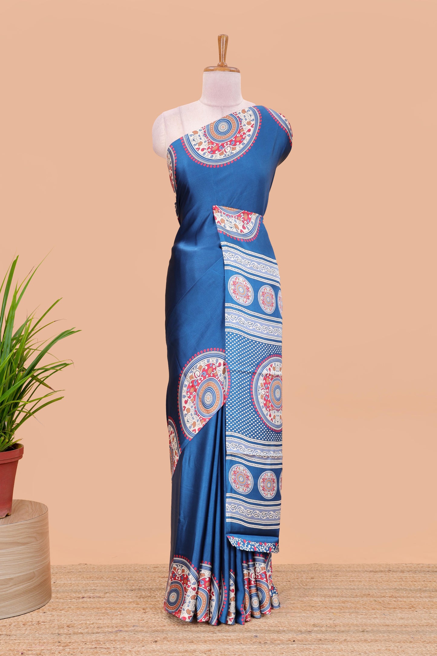 Blue color satin ajrakh modal printed saree with plain border and kalamkari print pallu