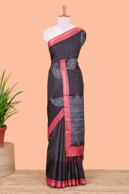 Black striped floral butta art tussar saree with contrast zari border and matching pallu