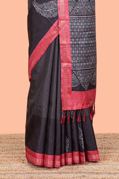 Black striped floral butta art tussar saree with contrast zari border and matching pallu