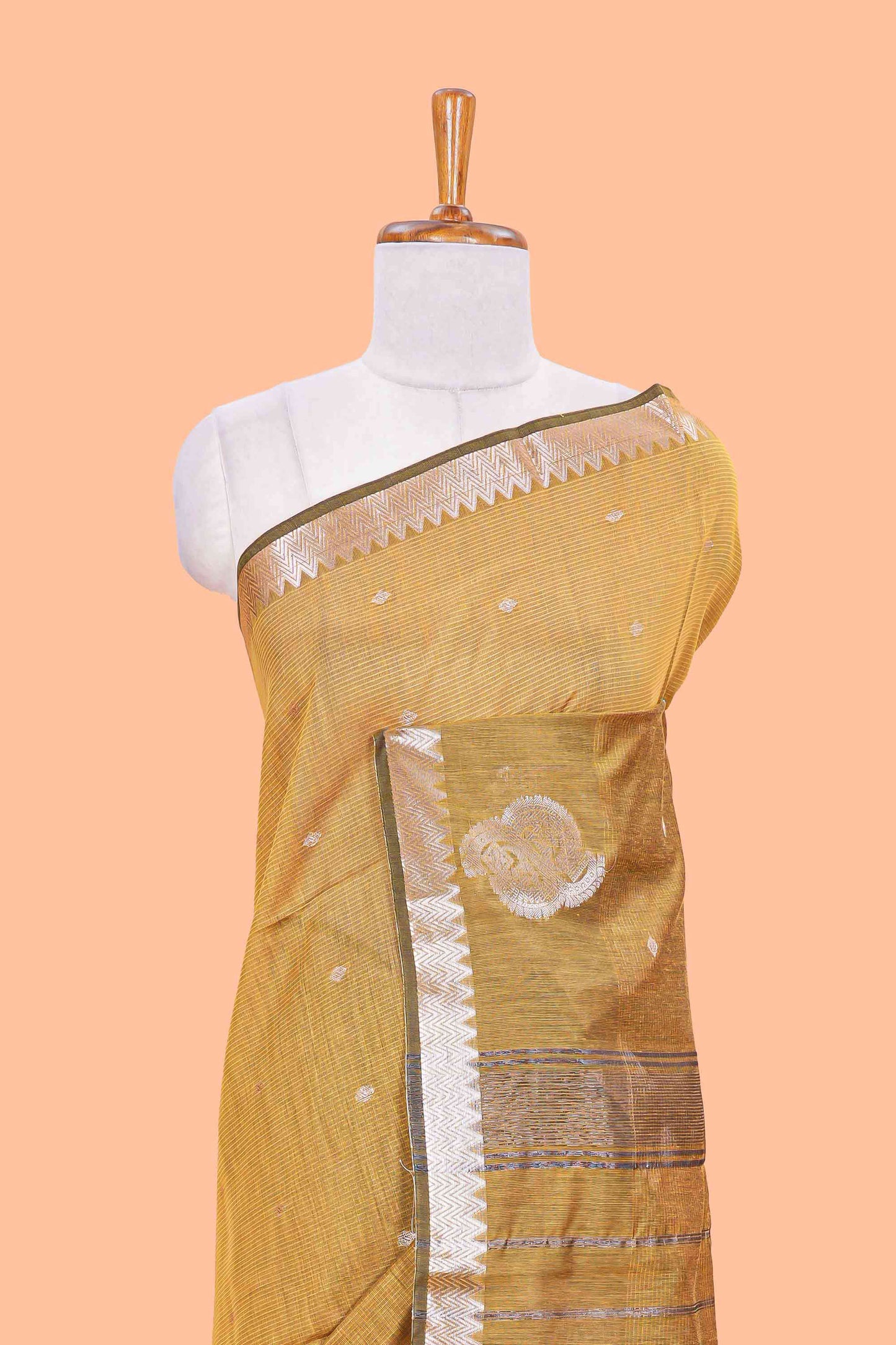 Mustard mushru silk saree with zari butta, self zari border and striped pallu