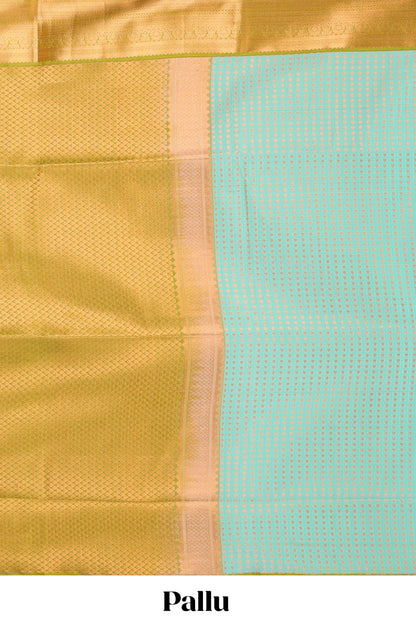 Green semi-soft silk saree featuring an all-over thousand butta design, paired with a contrasting border