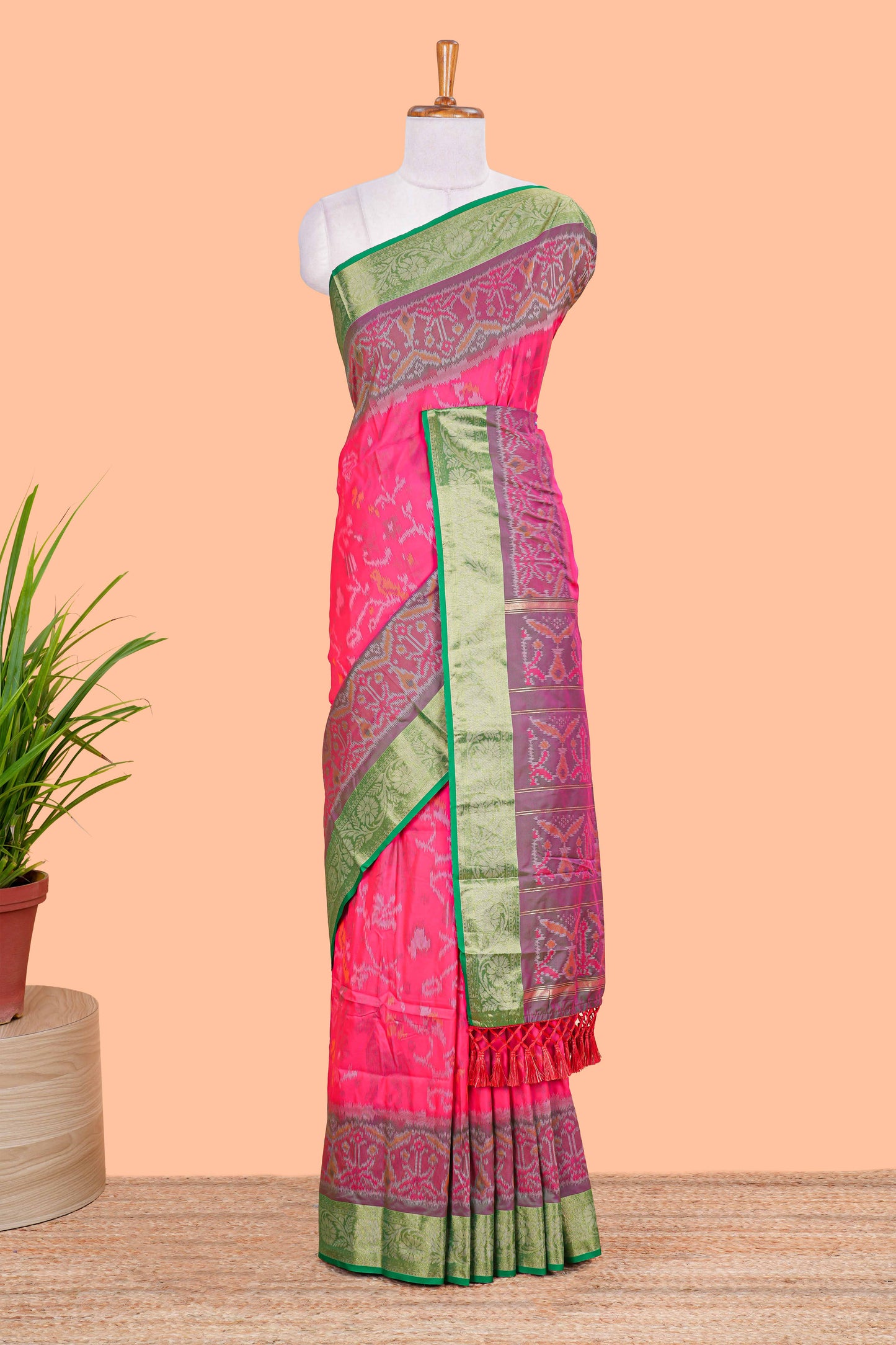 Pink ikkat style art silk saree with contrast border and printed pallu