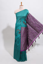 Borderless peacock green floral design art tussar saree with contrast pallu and motifs blouse