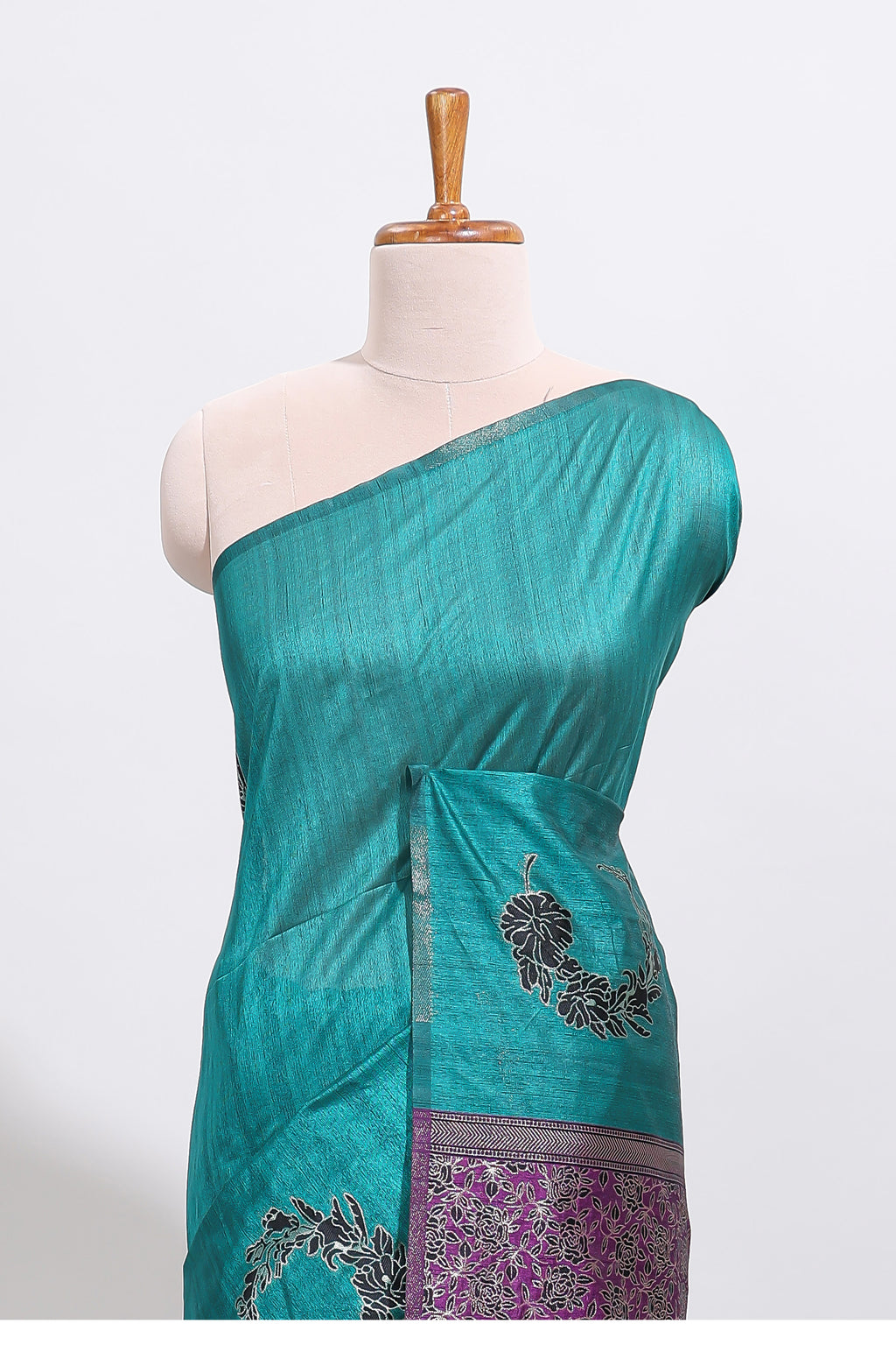 Borderless peacock green floral design art tussar saree with contrast pallu and motifs blouse