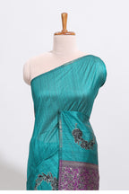 Borderless peacock green floral design art tussar saree with contrast pallu and motifs blouse