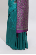 Borderless peacock green floral design art tussar saree with contrast pallu and motifs blouse