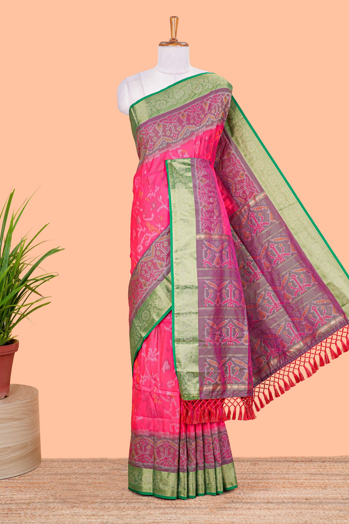 Pink ikkat style art silk saree with contrast border and printed pallu