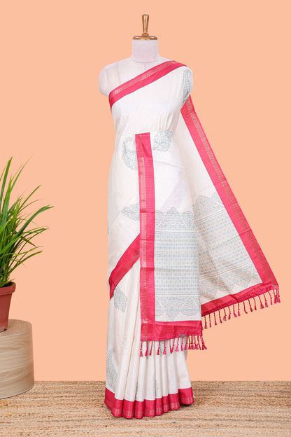 White striped floral butta art tussar saree with contrast zari border and matching pallu
