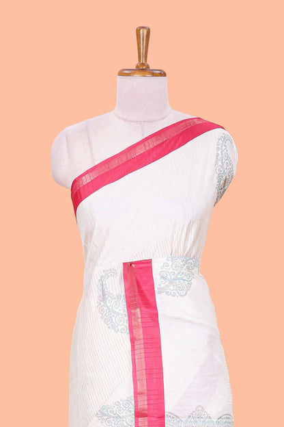 White striped floral butta art tussar saree with contrast zari border and matching pallu