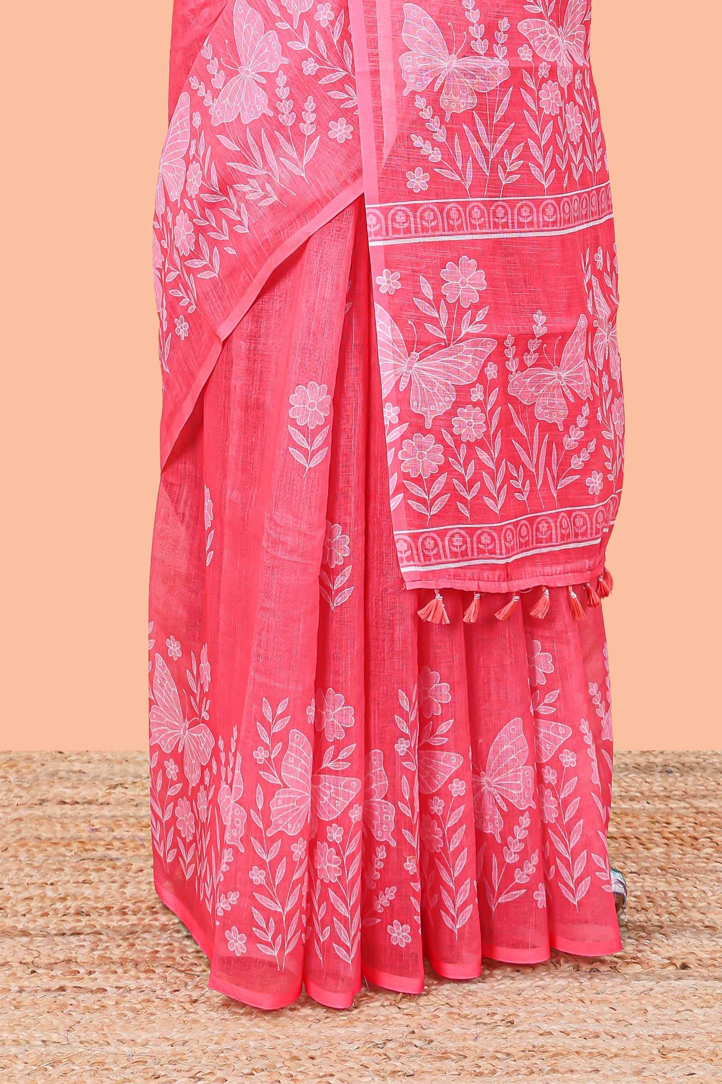 Pink linen cotton saree with floral buttas and butterfly motifs border, Printed self pallu and blouse