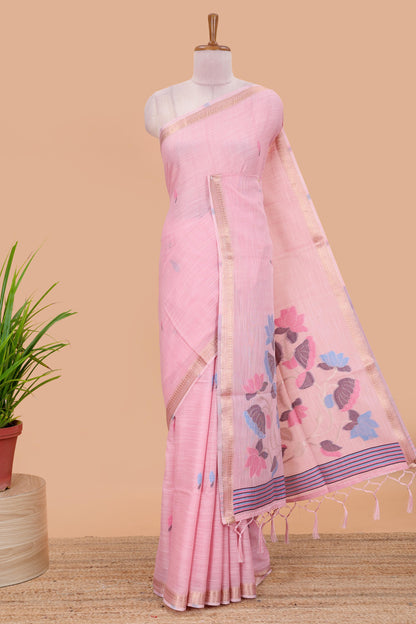 Pink linen cotton saree with buttas and floral design pallu, zari border