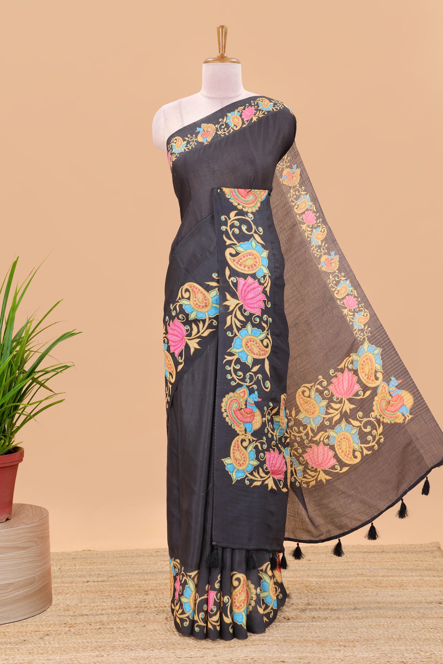 Black tanjore painting style linen tussar saree with peacock & lotus motifs and printed pallu