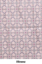 Tussar Silk Saree with a textured mauve body geometric woven border and a designer pallu with tassel along with blouse
