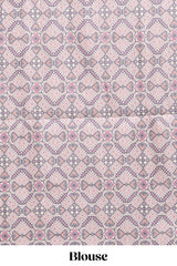 Tussar Silk Saree with a textured mauve body geometric woven border and a designer pallu with tassel along with blouse
