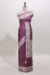 Tussar Silk Saree with a textured violet body geometric woven border and a designer pallu with tassel along with blouse