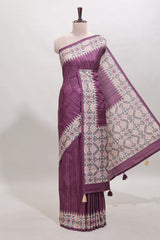 Tussar Silk Saree with a textured violet body geometric woven border and a designer pallu with tassel along with blouse