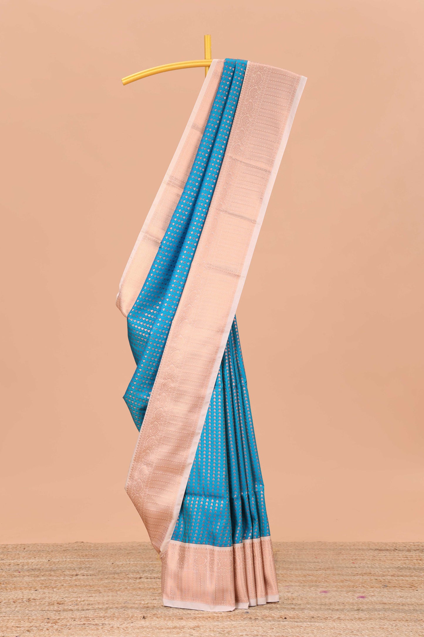 Blue checked vairaoosi semi soft silk saree with floral zari butta and contrast Pallu