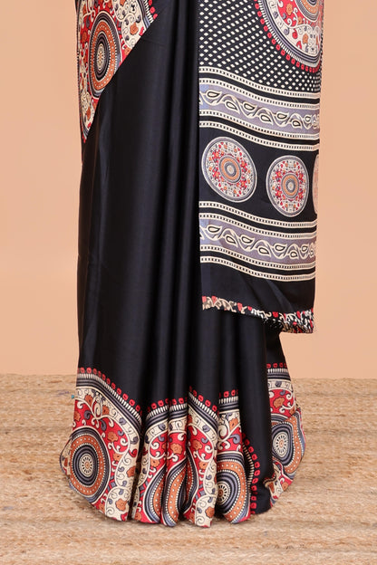 Black color satin ajrakh modal printed saree with plain border and kalamkari print pallu