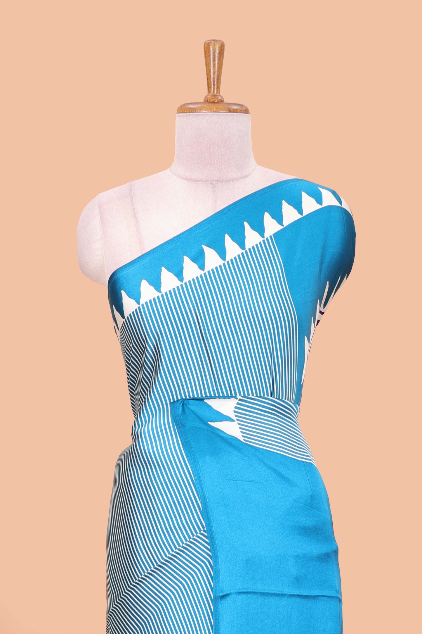 Blue satin ajrakh modal printed saree with striped body and geometric print border and pallu