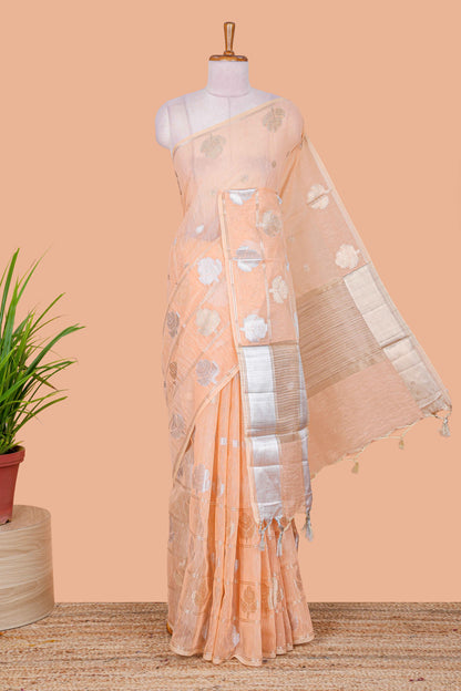 Orange floral zari butta linen tissue saree with zari border and contrast blouse