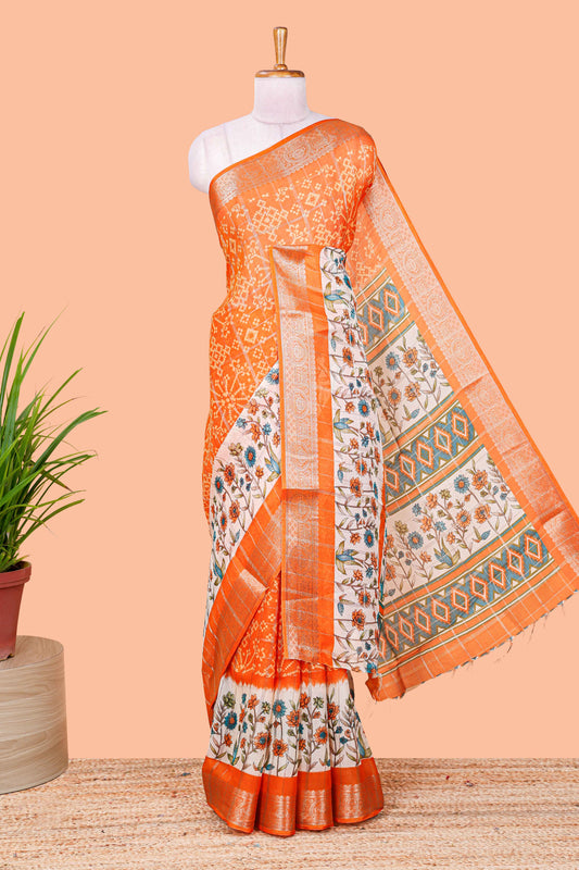 Orange floral ikkat style marsh georgette saree with zari border and contrast blouse