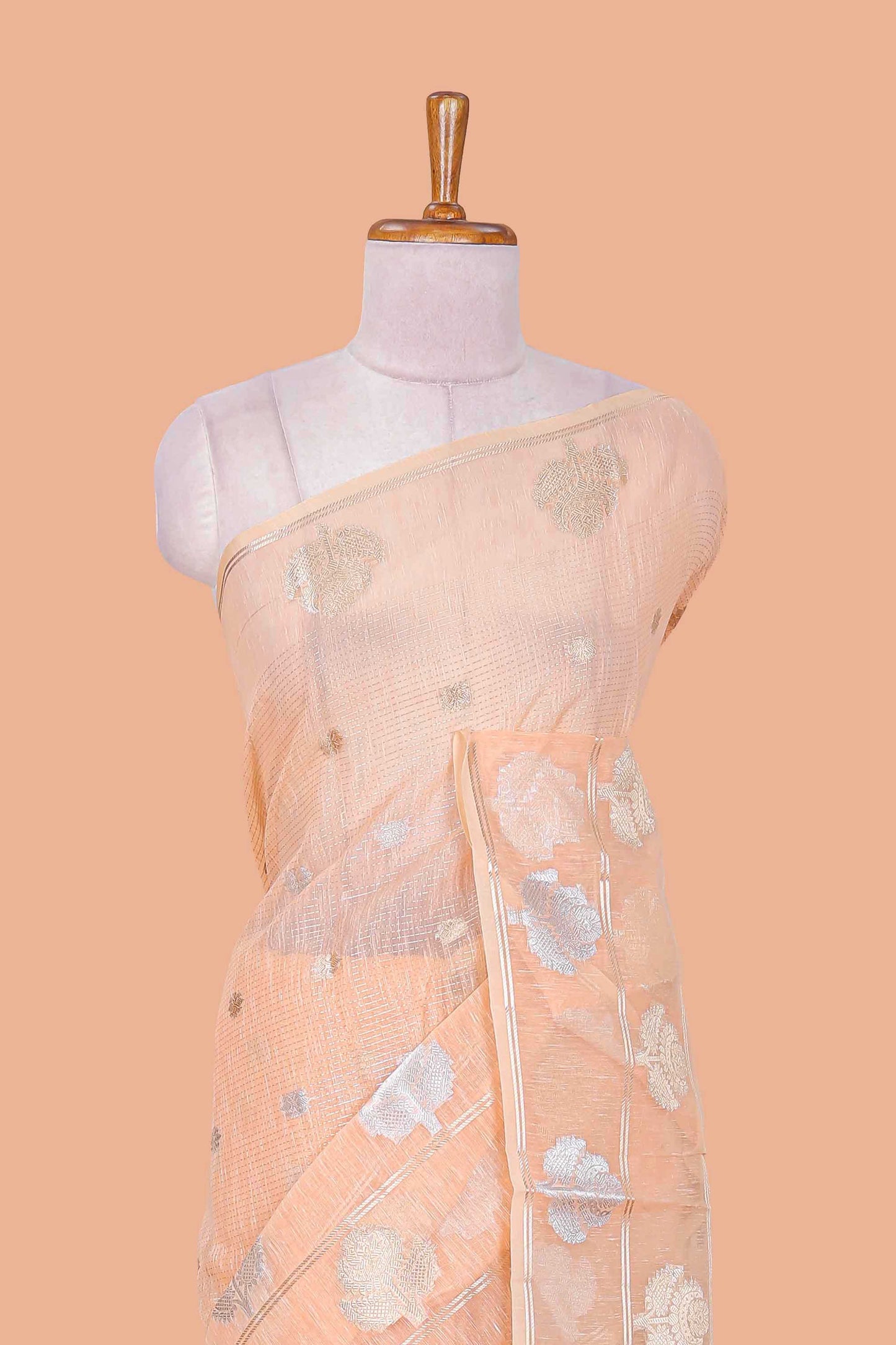Orange floral zari butta linen tissue saree with zari border and contrast blouse