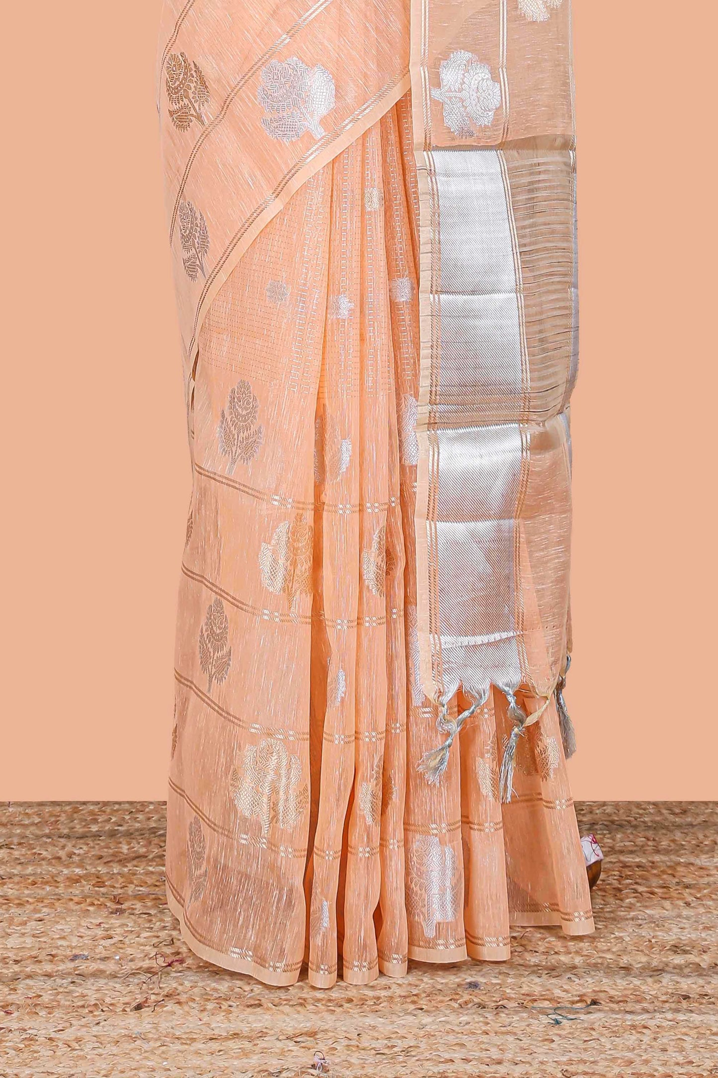 Orange floral zari butta linen tissue saree with zari border and contrast blouse
