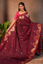 Maroon Semi soft Silk Saree Gold Zari Woven Paisley Motifs with Woven Zari Border and Contrast Blouse