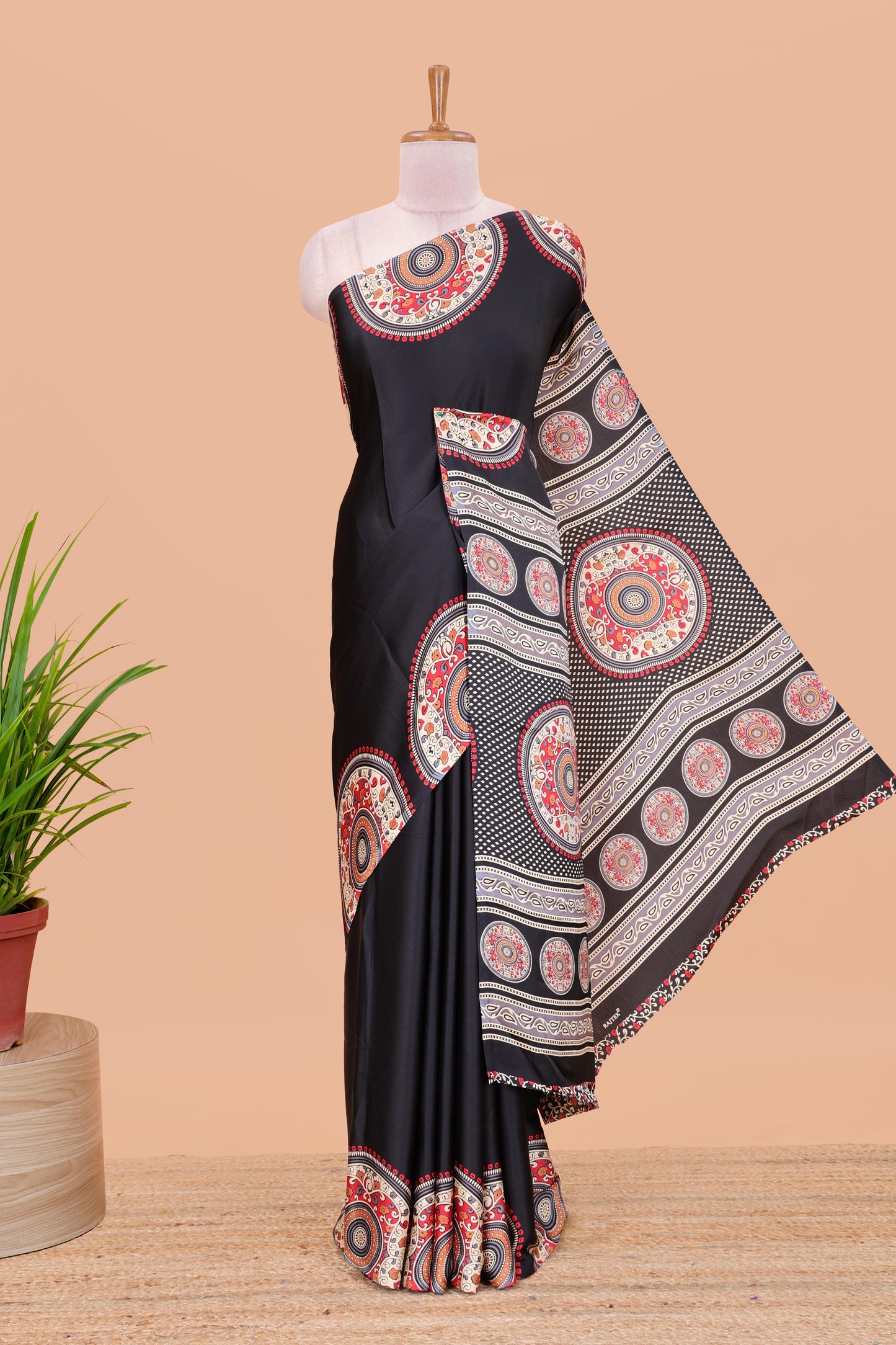 Black color satin ajrakh modal printed saree with plain border and kalamkari print pallu