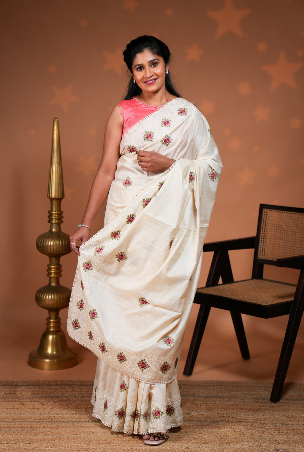Cream embroidery floral motifs design raw silk saree with self border and matching blouse
