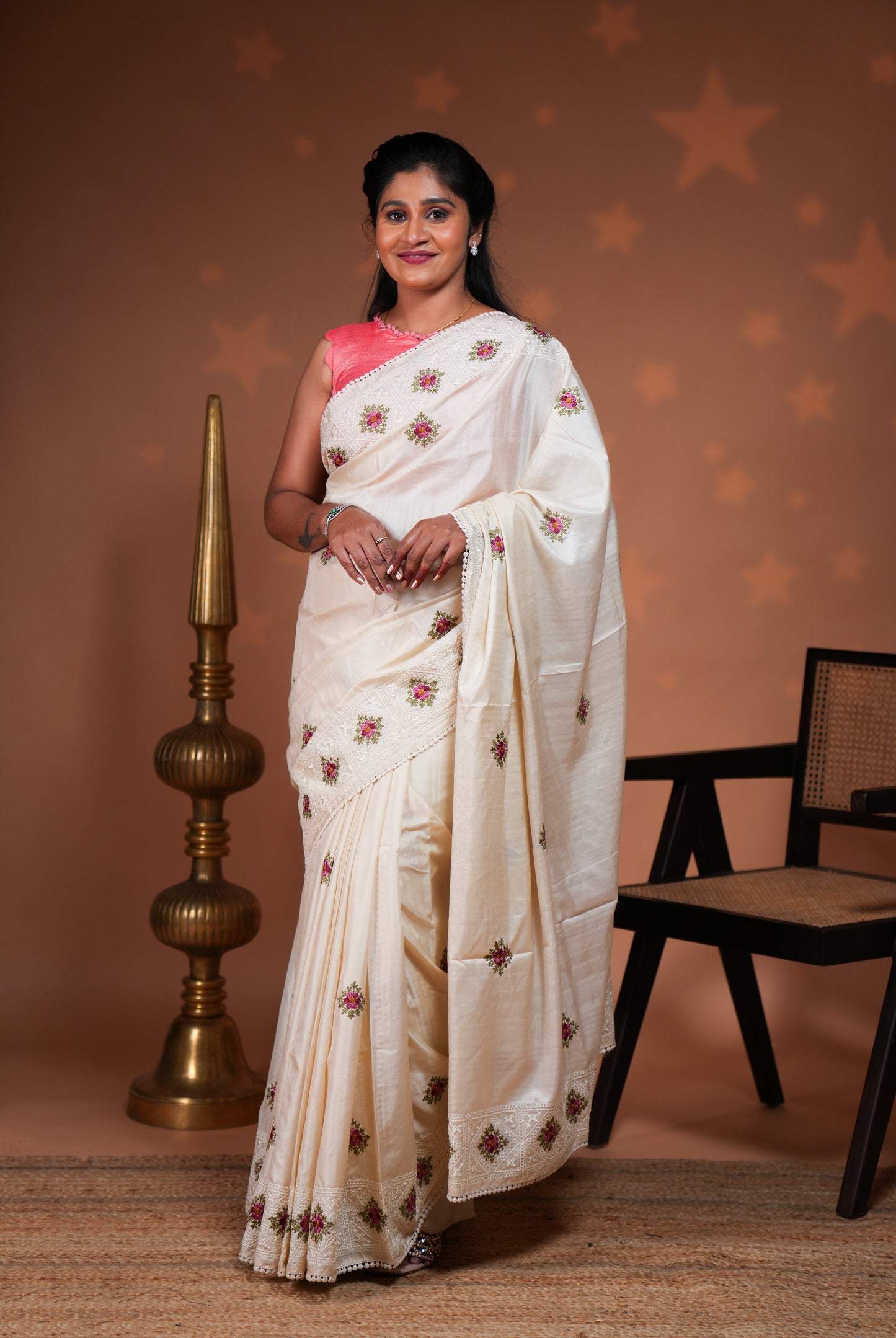Cream embroidery floral motifs design raw silk saree with self border and matching blouse