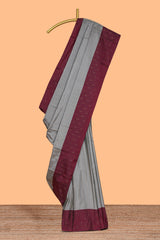 Grey striped design arani gift saree with contrast border and matching blouse