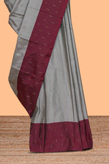Grey striped design arani gift saree with contrast border and matching blouse