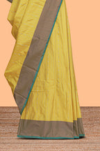 Yellow striped design arani gift saree with contrast border and plain blouse