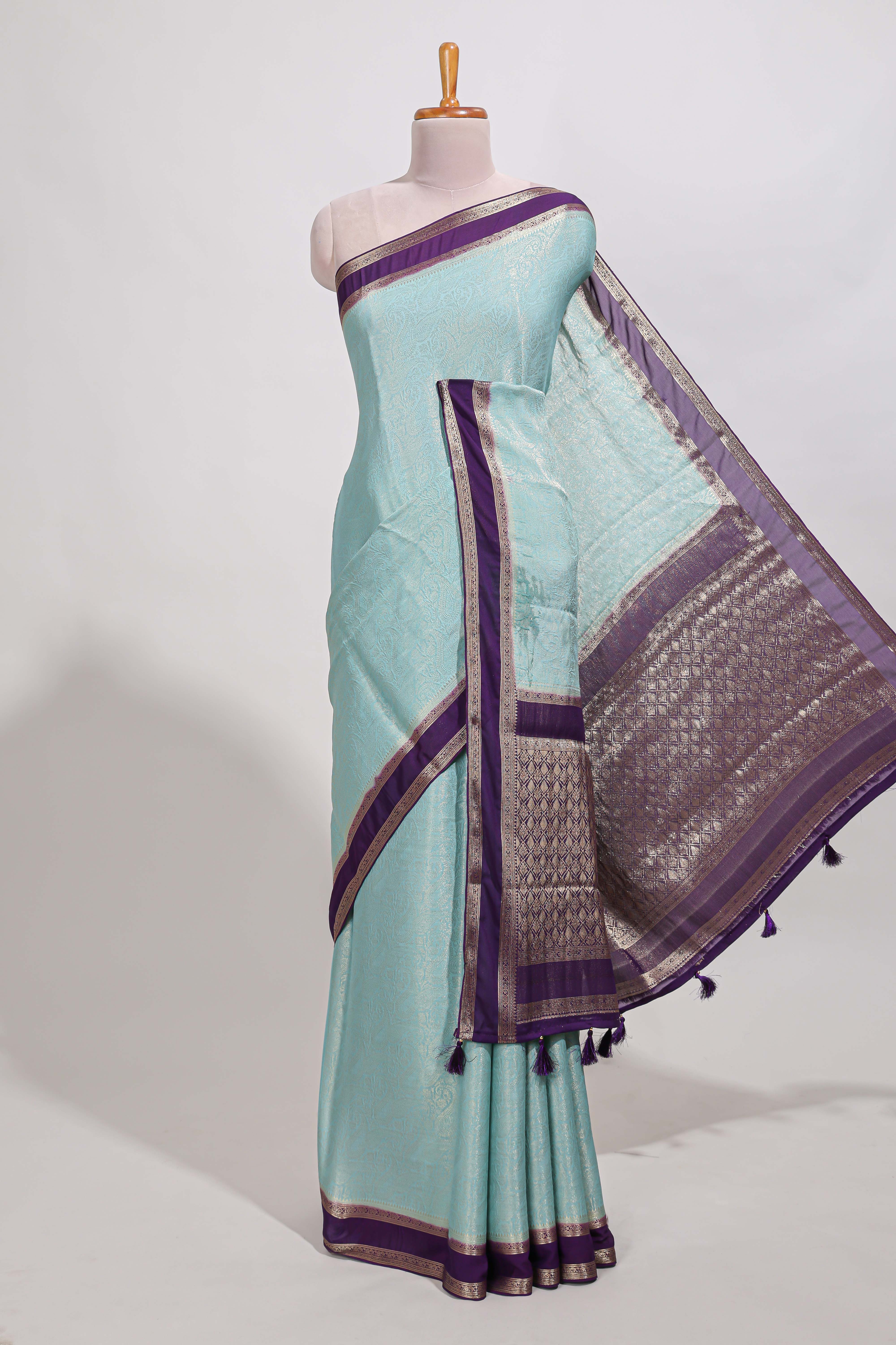 Light blue art mysore silk saree with retta petta contrast border and rich pallu with plain blouse