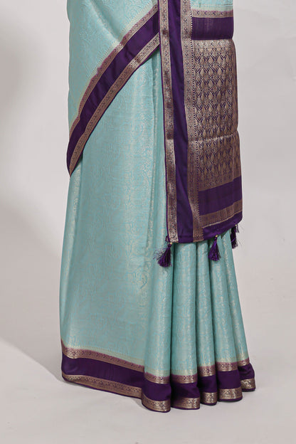 Light blue art mysore silk saree with retta petta contrast border and rich pallu with plain blouse